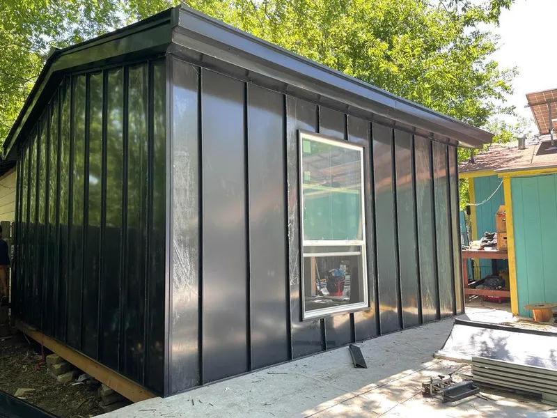 Black standing seam metal wall panels for Roof Inspection in Duluth