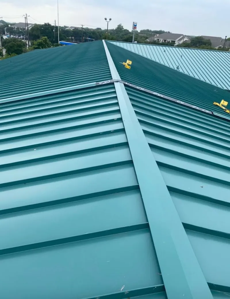 Green commercial metal roof ridge and valley for Metal Roof Repair in Duluth